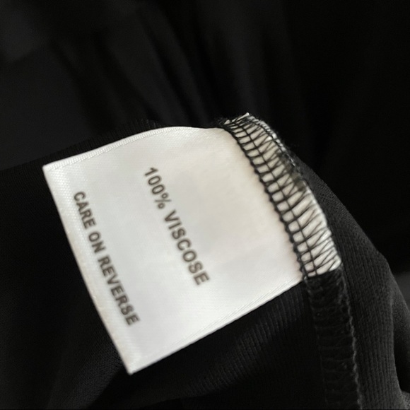 St. John couture black sleeveless dress w/plunge neckline - Picture 14 of 14